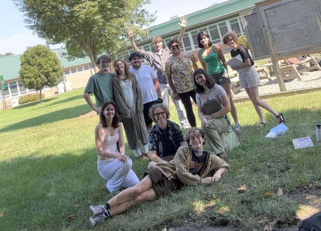 Hen & Ink Society members hanging out outside, fall 2025